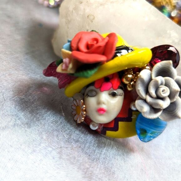 Wendy Gell Brooch Adagio face with Hat, flowers, Ruby Swarovski and blue heart. - Picture 1 of 2